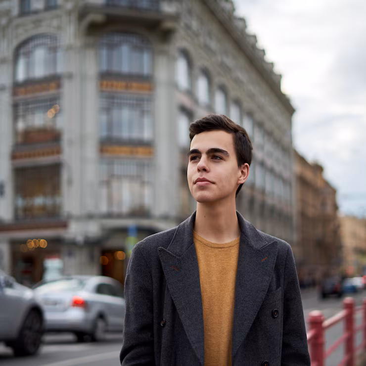 handsome-stylish-fashionable-man-brunette-elegant-gray-coat-stands-street_73872-1637
